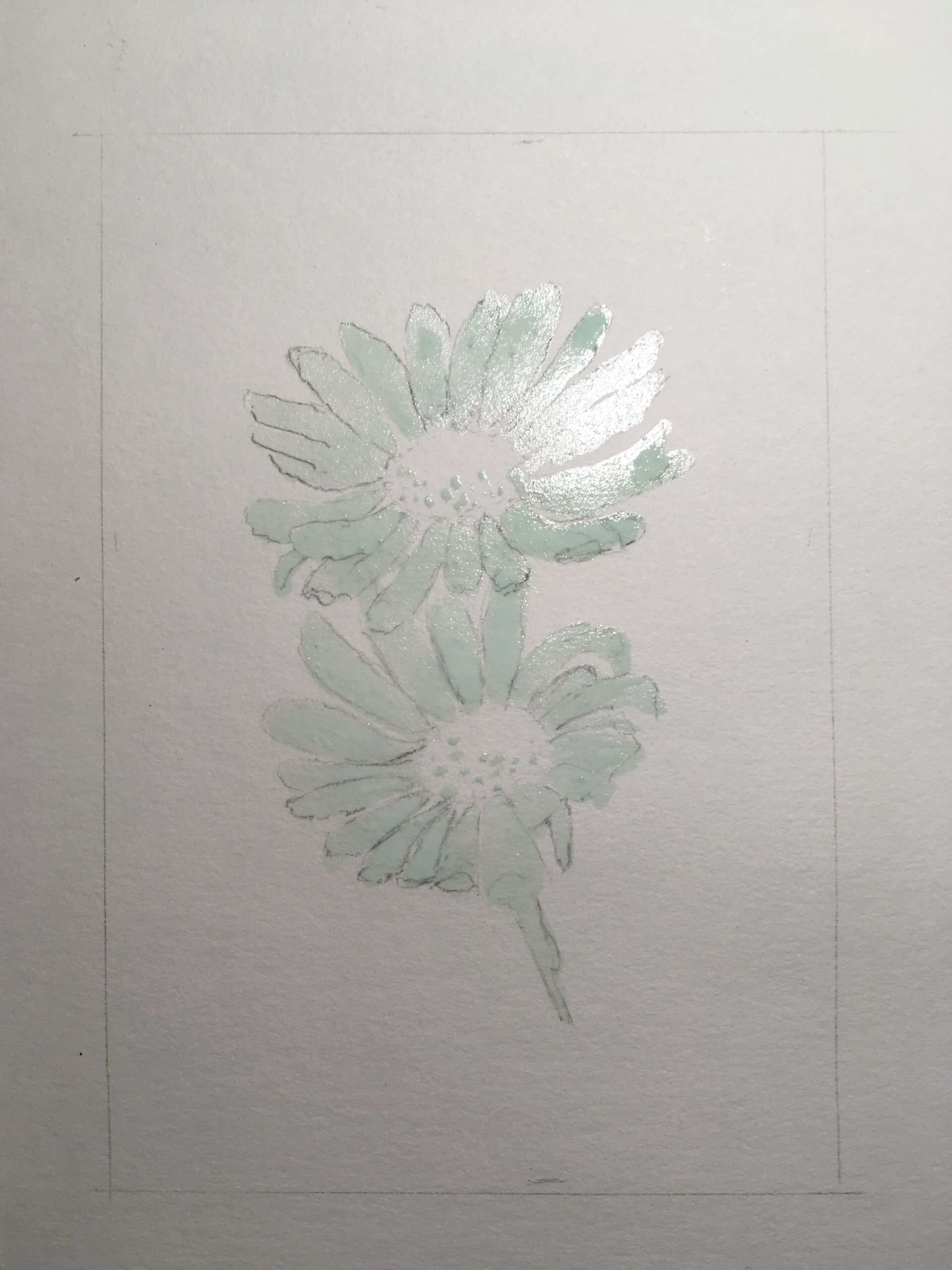 Pale green masking fluid that looks shiny under the light.