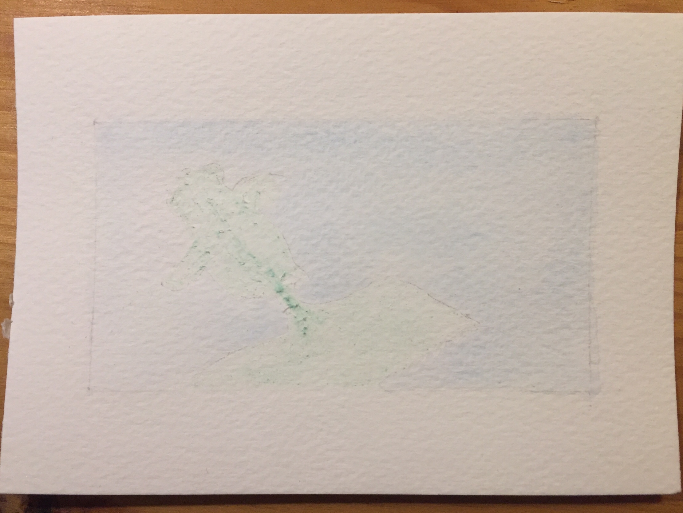 Scrapped paper and residue of the green masking fluid that would not be removed