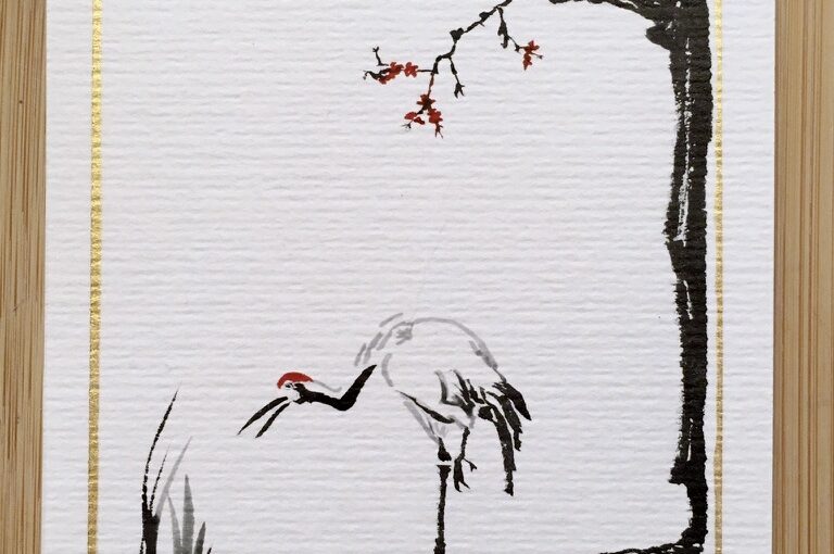 Black, grey and red ink drawing of a Japanese crane standing between some reed and an old tree with red blossoms.