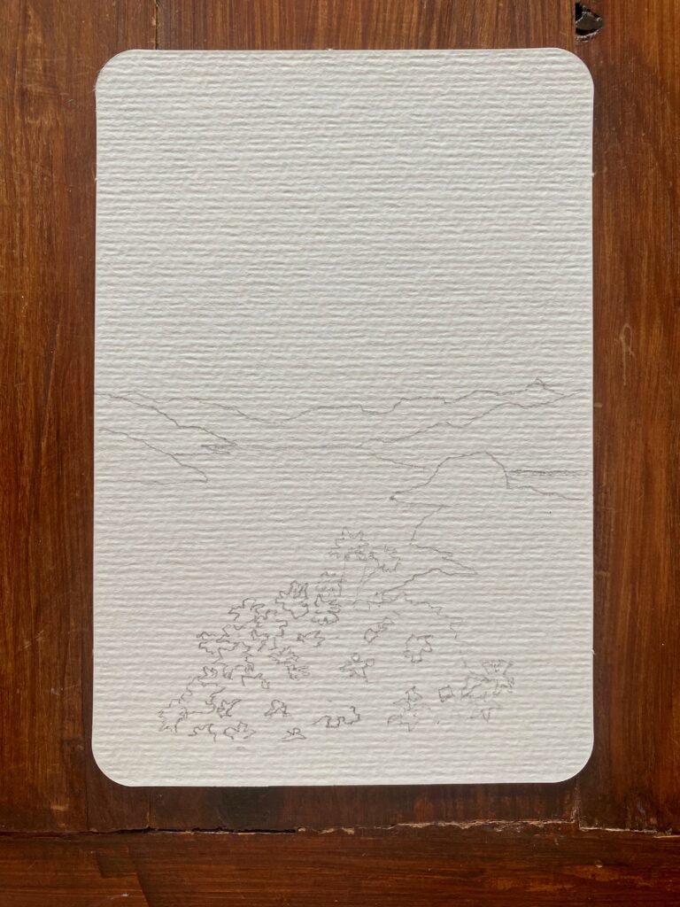 Loose pencil sketch on textured watercolour postcard. The outline marks a bush of flowers in the foreground and where the land it around the lake.
