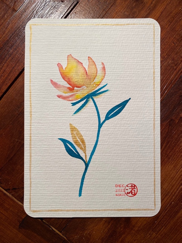 Watercolor mixing yellow and red, golden ink, and blue-green ink brushpen. This represents a flower, stem and leaves. This card is painted in portrait orientation. There is a golden outline near the edges of the card which I painted with a thin brush and liquid gold ink. The bottom right has my signature: a red Japanese kanji meaning roughly “comes from near the sea”, my nickname and the date.