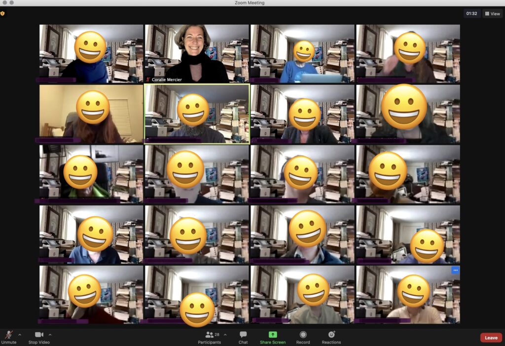 Screenshot of our zoom meeting where everyone (but one person) in the 4 x 5 grid of video feeds uses the same background image. Everyone's face but mine has been replaced by a smiley.
