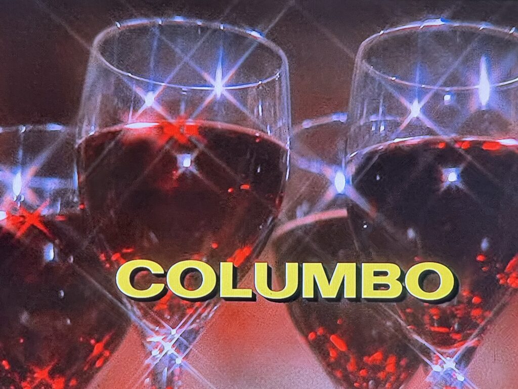 Episode title interstitial showing as background closeups of red wine glasses where the wine shines in red stars and the crystal in white stars