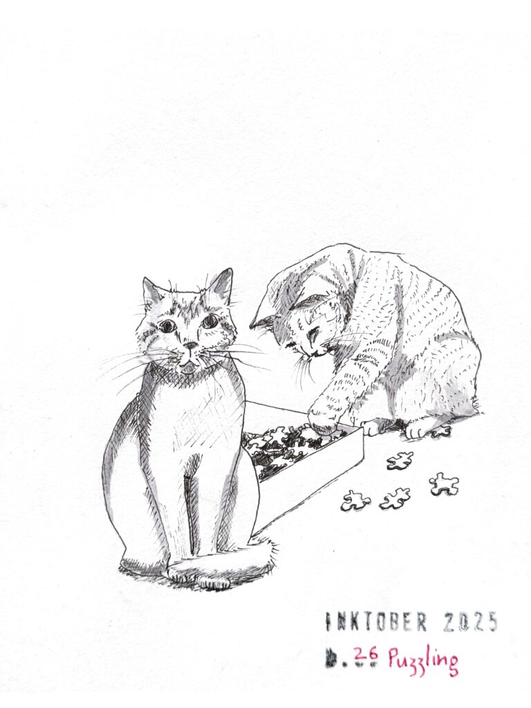 A minimalist black ink drawing featuring two cats. One cat sits attentively while the other behind it is playfully interacting with an open box of puzzle pieces, some of which are scattered between them. There are a few grey ink shadows on the cats. The drawing is titled "Inktober 2025” and “26 Puzzling”.